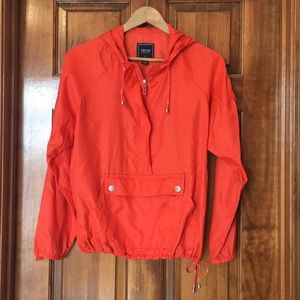 IZOD orange windbreaker jacket